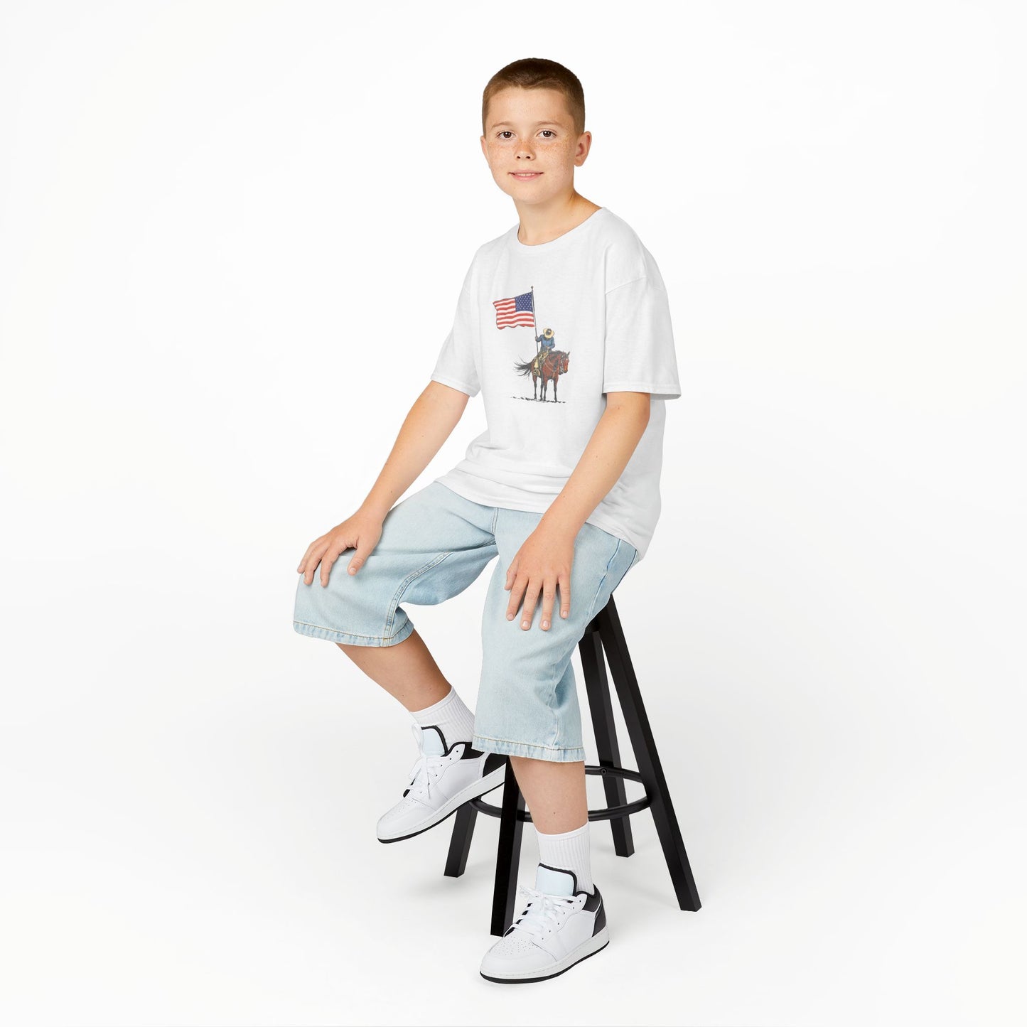 Kids Tee — Cowboy on Horse Holding American Flag (Patriotic Western Shirt)