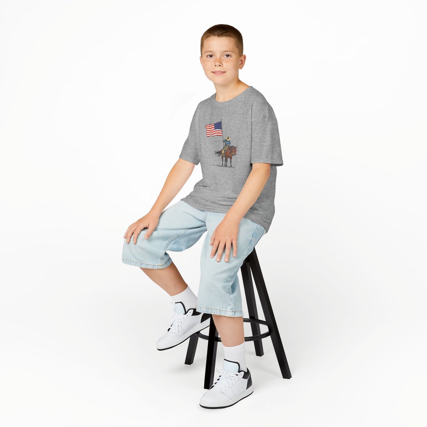 Kids Tee — Cowboy on Horse Holding American Flag (Patriotic Western Shirt)