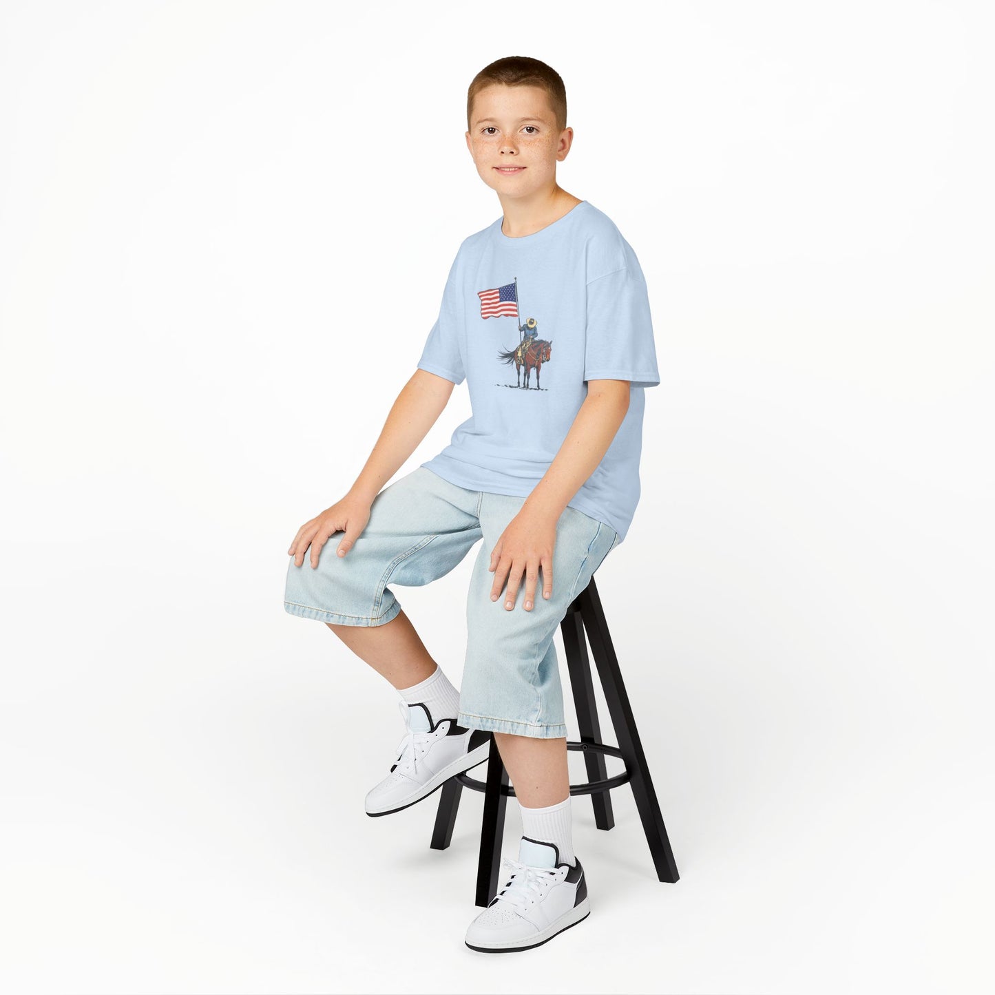 Kids Tee — Cowboy on Horse Holding American Flag (Patriotic Western Shirt)