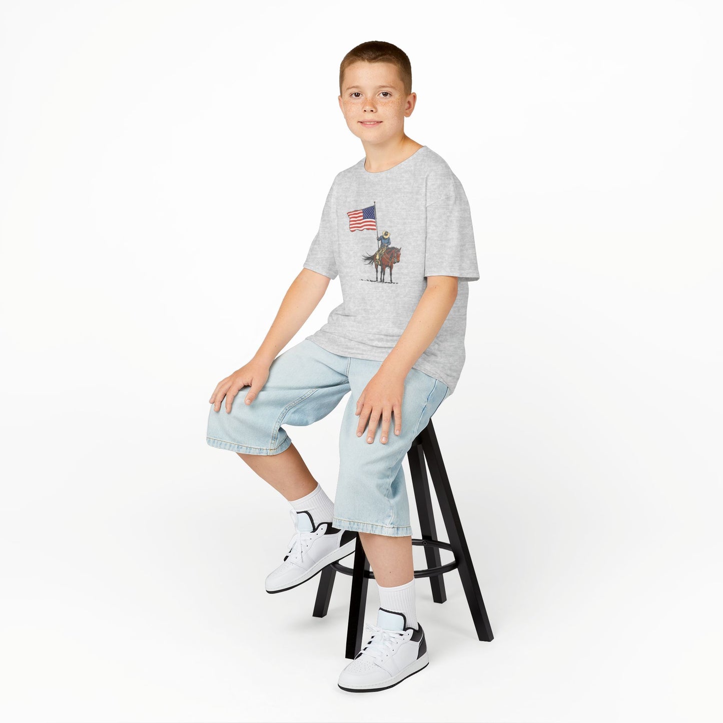 Kids Tee — Cowboy on Horse Holding American Flag (Patriotic Western Shirt)